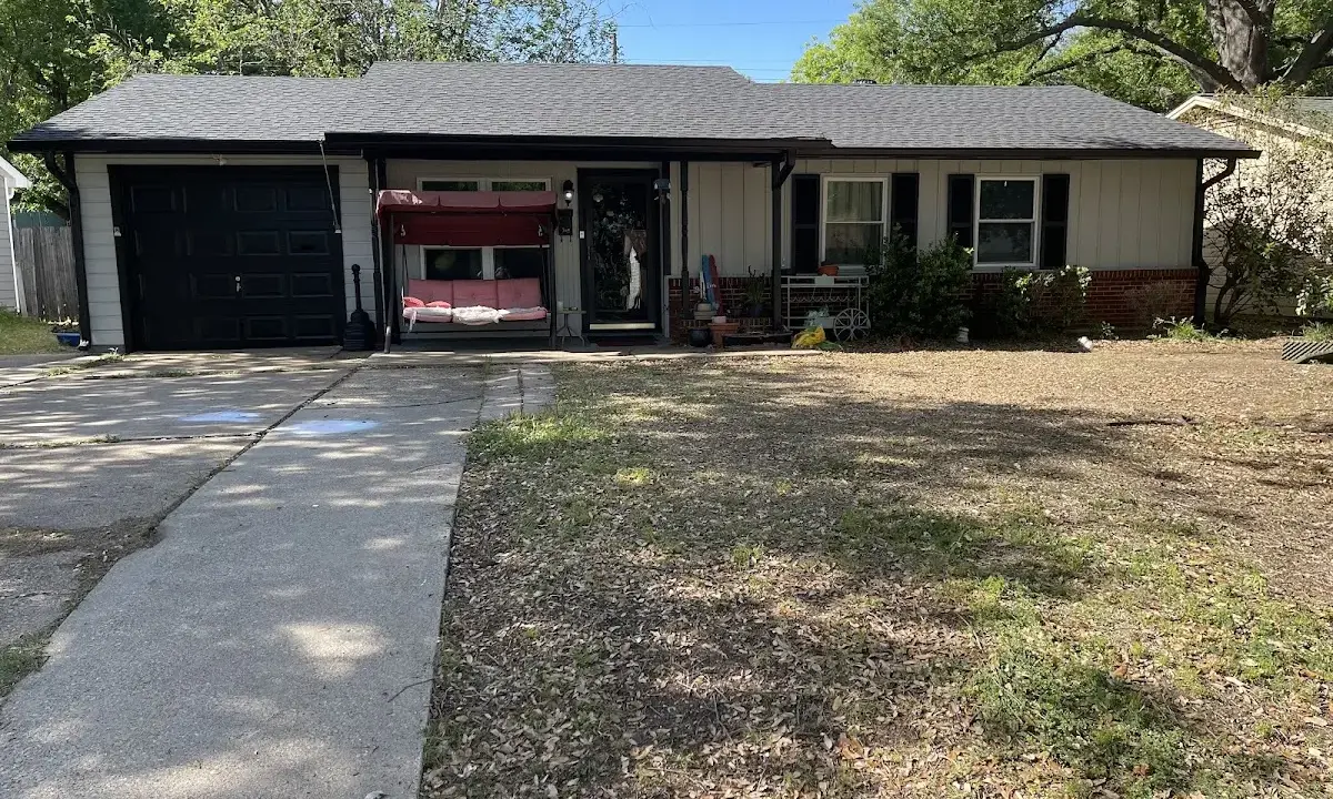 Asphalt Shingle Roof Repair crew at work on a residential roof in Granite Shoals